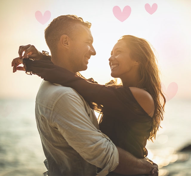 young-happy-couple-beach-hearts-mob