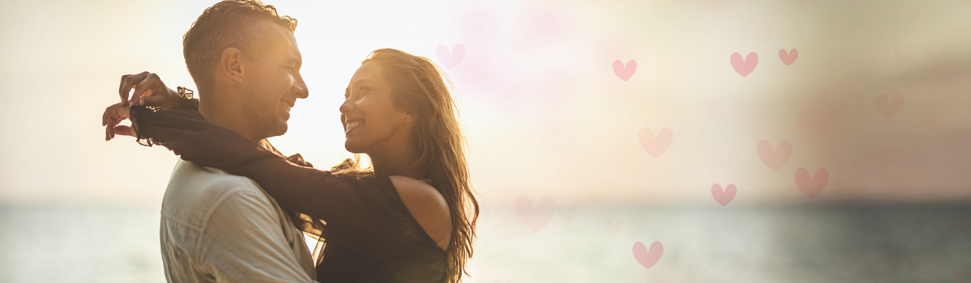 young-happy-couple-beach-hearts-desk